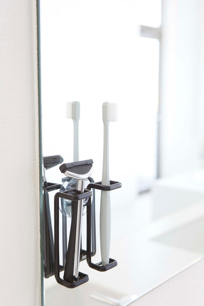 media image for Tower Suction Cup Mounted Toothbrush Holder by Yamazaki 226