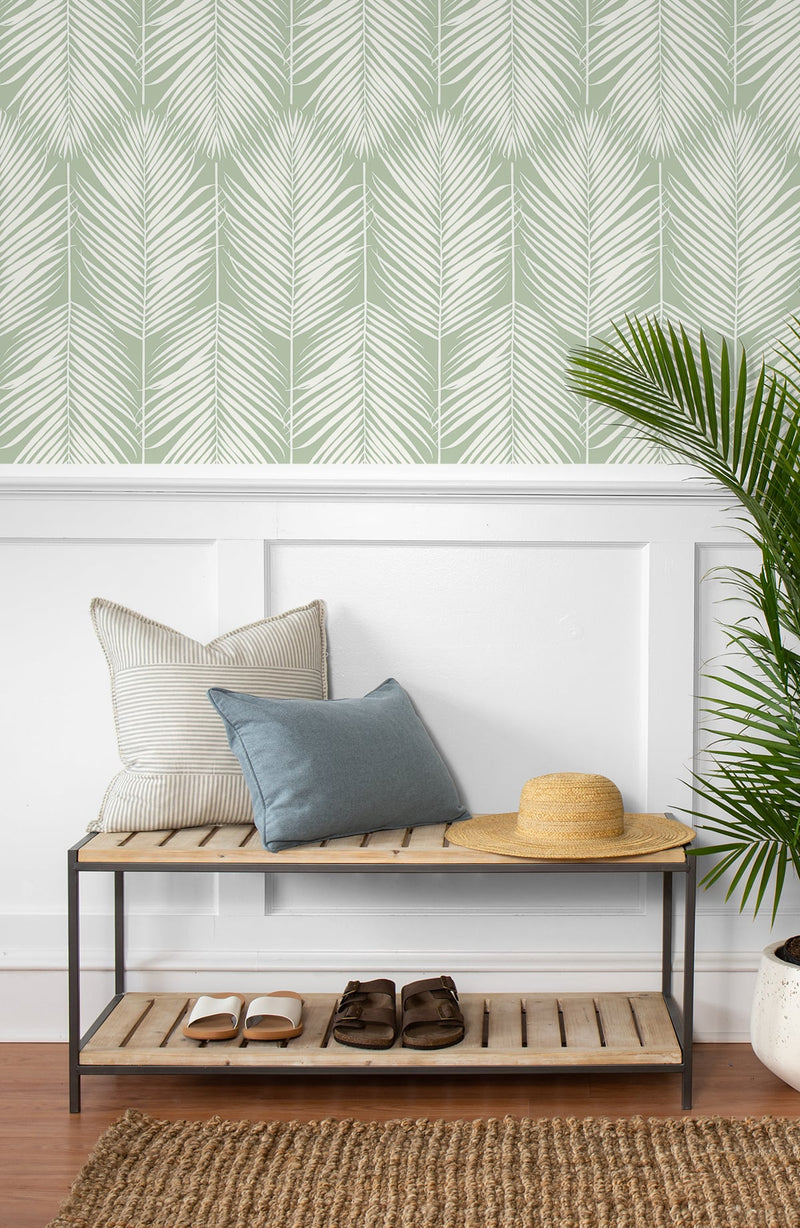 media image for Palm Silhouette Peel-and-Stick Wallpaper in Pastel Green by NextWall 235