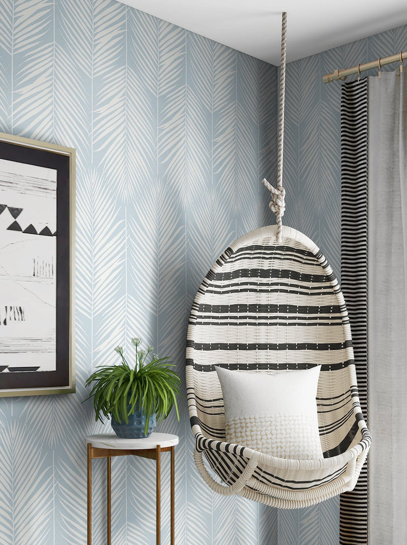 media image for Palm Silhouette Peel-and-Stick Wallpaper in Hampton Blue by NextWall 275