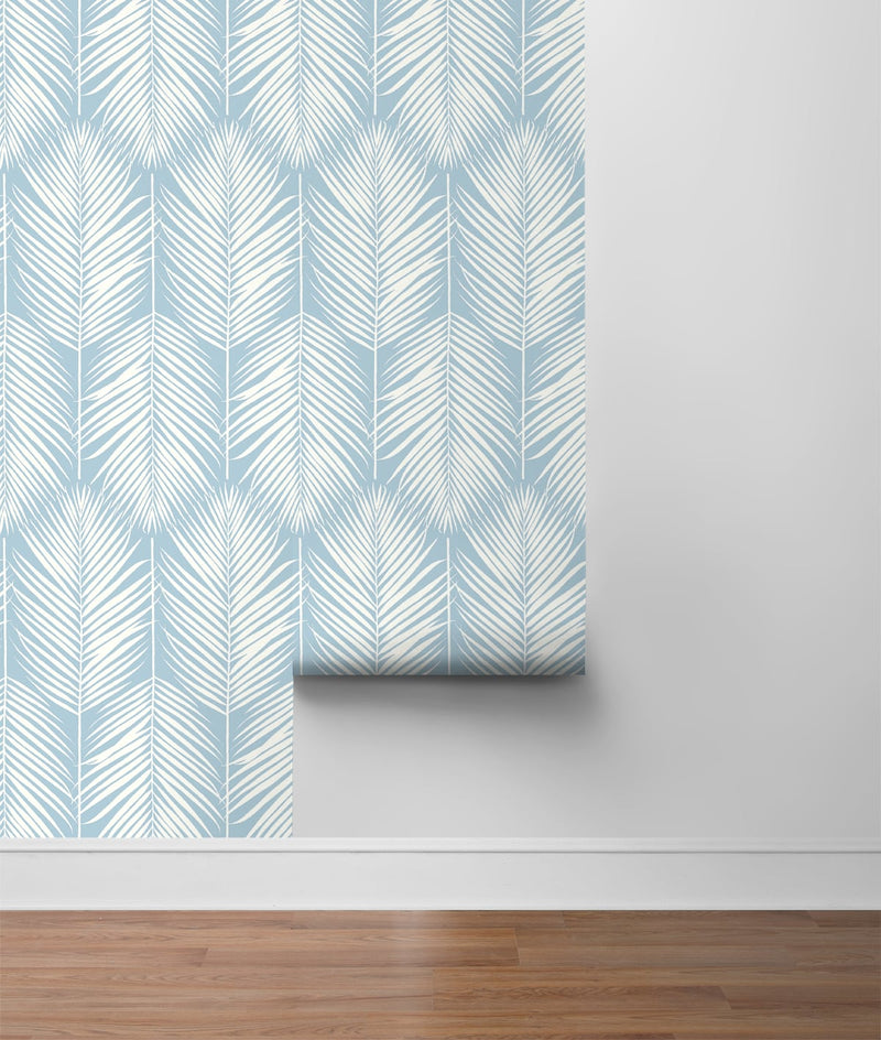 media image for Palm Silhouette Peel-and-Stick Wallpaper in Hampton Blue by NextWall 211