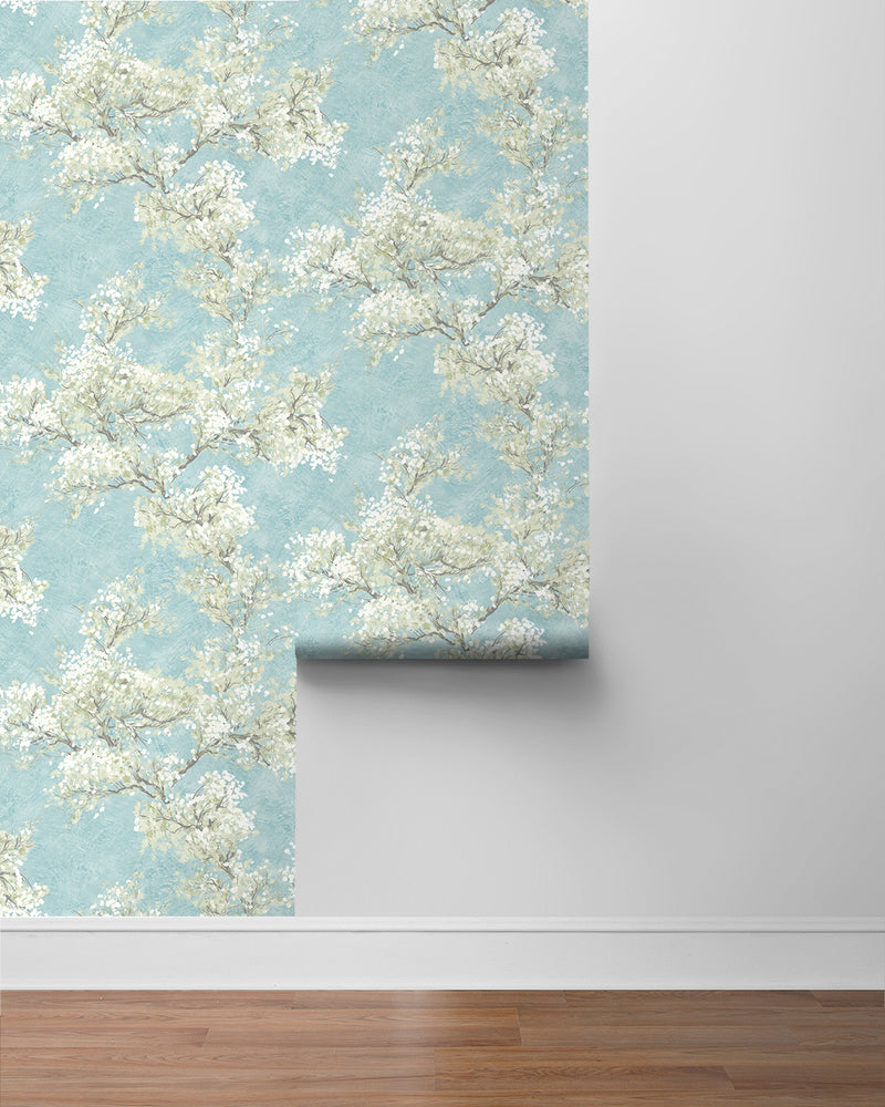 media image for Cherry Blossom Grove Peel-and-Stick Wallpaper in Blue Mist & Green Tea 232