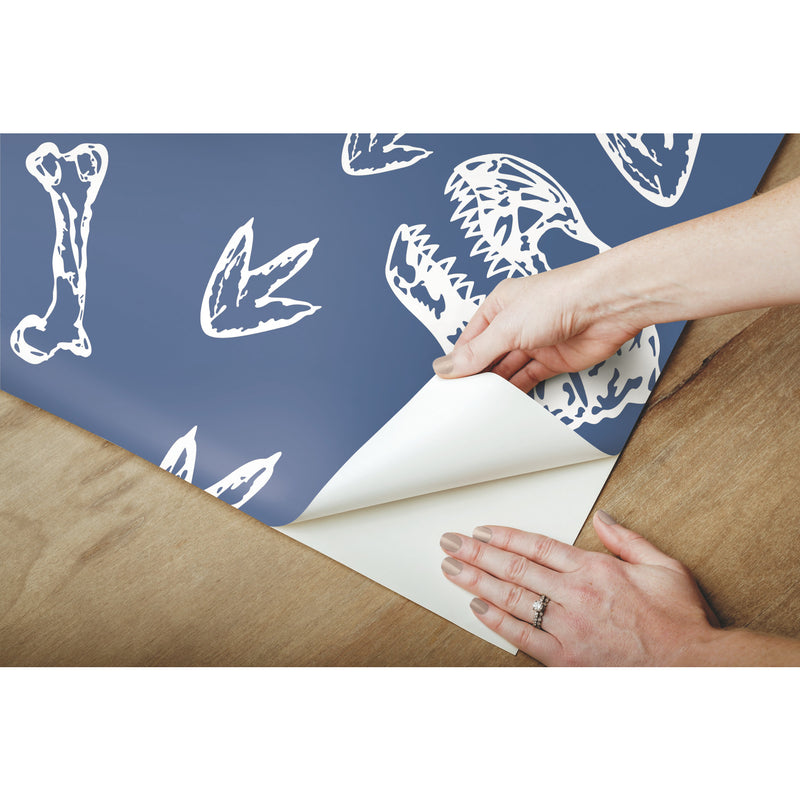 media image for Dinosaur Bones Peel & Stick Wallpaper in Blue by RoomMates 230