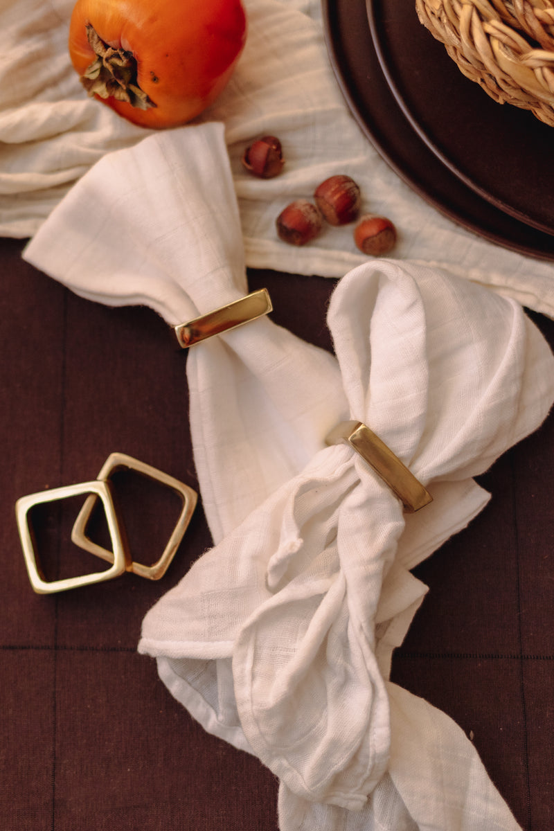 media image for square metal napkin rings on leather tie in brass finish design by bd edition 2 217