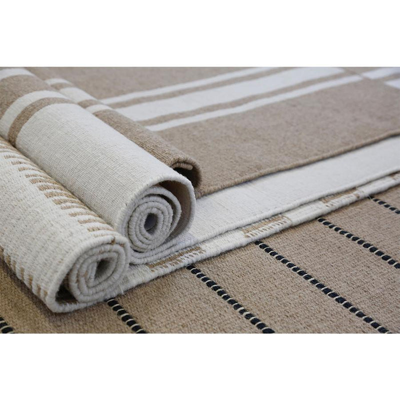 media image for warby handwoven rug in natural in multiple sizes design by pom pom at home 9 273