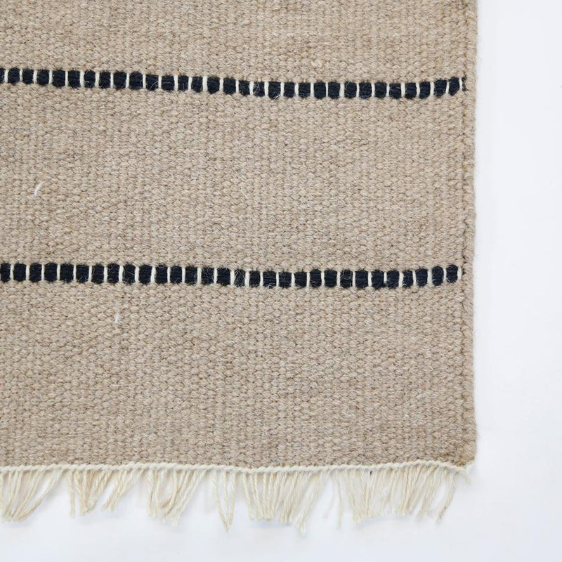 media image for warby handwoven rug in natural in multiple sizes design by pom pom at home 7 299